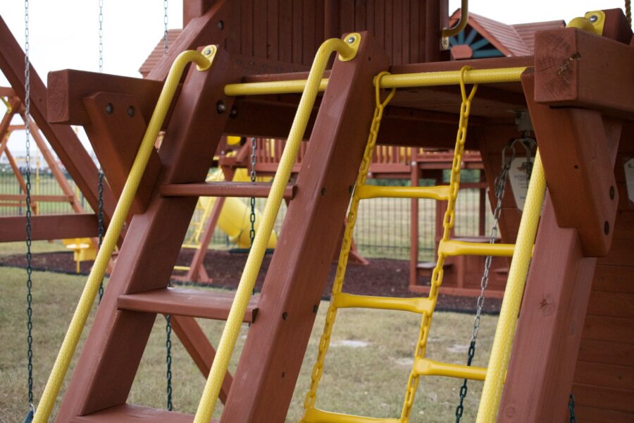 6.5 Jaguar Playcenter w/ Wood Roof, Treehouse Panels and Green DoubleWall Scoop Slide