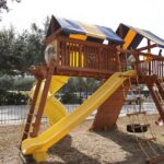 7.4 Jaguar Playcenter w/ BYB Tarp, 4x6 Monkey Bars, Loft, Yellow DoubleWall Scoop Slide and Yellow Spiral Slide