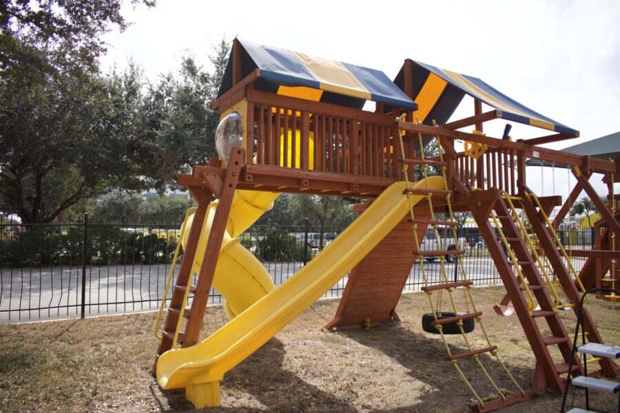 7.4 Jaguar Playcenter w/ BYB Tarp, 4x6 Monkey Bars, Loft, Yellow DoubleWall Scoop Slide and Yellow Spiral Slide