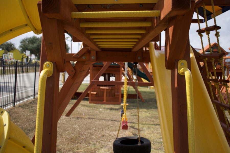 7.4 Jaguar Playcenter w/ BYB Tarp, 4x6 Monkey Bars, Loft, Yellow DoubleWall Scoop Slide and Yellow Spiral Slide